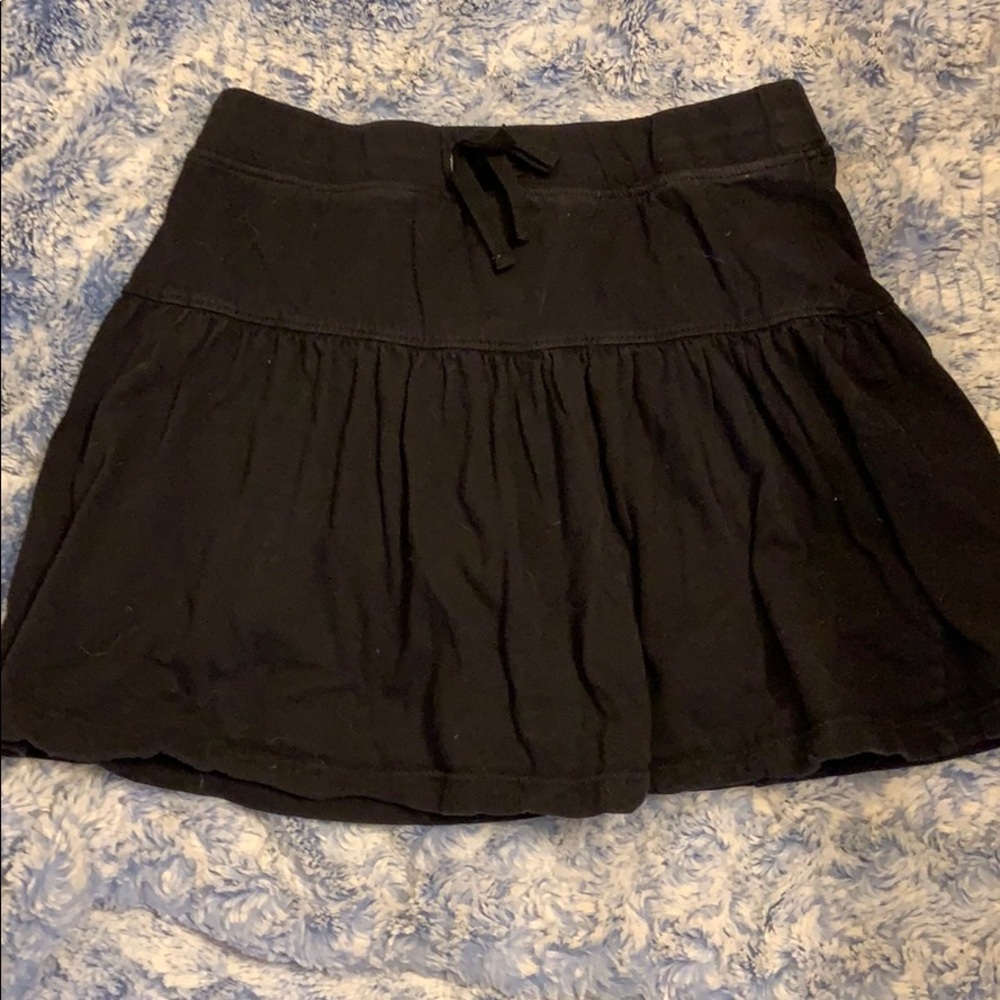 Girls Black cotton skirt. Size 14/16